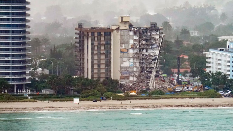 9 dead from collapse of high-rise apartment complex