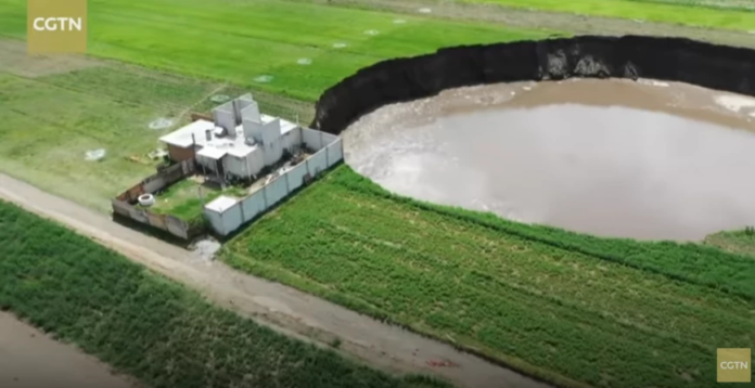 The huge and impressive sinkhole that appeared in the middle of a field