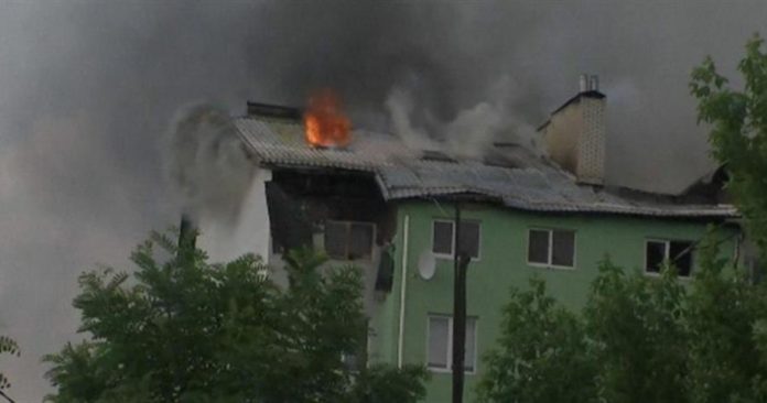 Explosion and fire in an apartment building