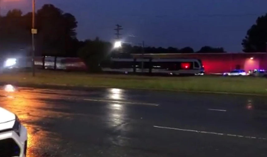 Two brothers were killed by a train at the memorial service for their brother, who died at the same place