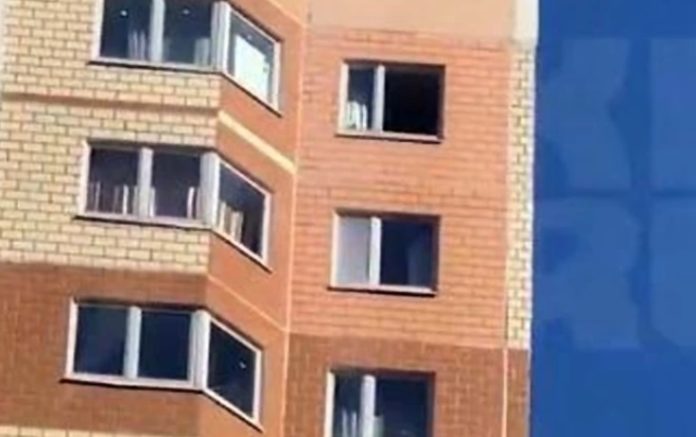 A mother made a death dive from the 19th floor holding her newborn baby and 3-year-old son in her arms