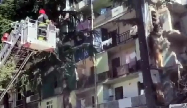 Five-story building collapses - Many trapped reported